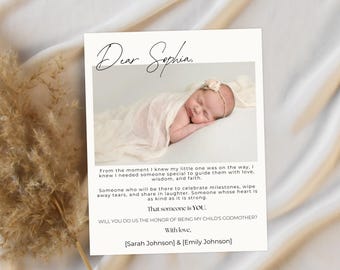 May include: A white card with the text "Dear Sophia" and a photo of a sleeping baby. The card asks Sophia to be the child's godmother, signed by Sarah and Emily Johnson.