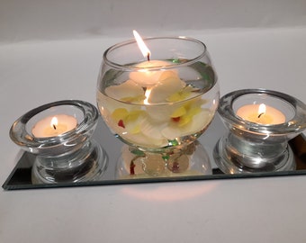 White Floating Candle Centre Piece Set with Mirror Plate Base, Glass Bowl, Artificial Flowers, Glass Tealight Holders and Floating Candle.