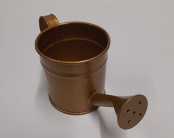 Mini Metal Watering Can in Gold. 2 inches x 2 inches x 4.5 inches. Craft supply with many uses. Not for use as watering can. Great Prices !