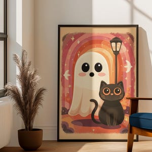 May include: Framed Halloween art print. It depicts a friendly ghost, a black cat, and a street lamp against a rainbow background. The artwork has a vintage style with warm colours and whimsical details, ideal for seasonal decor.