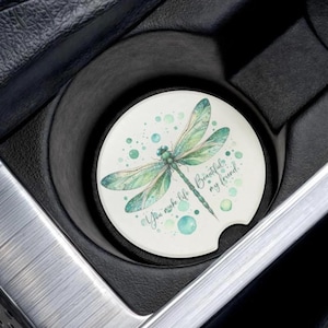 May include: A set of three ceramic mugs with a speckled, matte finish. The mugs are in shades of cream, light gray, and dark gray. Each mug has a simple, minimalist design, perfect for coffee or tea.