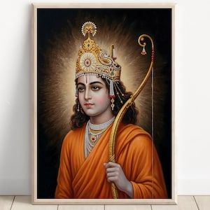 May include: A framed portrait of a figure in an orange robe, wearing a jeweled crown and necklace. The figure holds a golden bow, set against a dark background with a golden halo effect. The artwork is a detailed illustration.