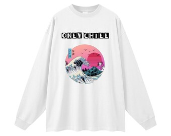 May include: White long-sleeve shirt with a graphic of a wave, sunset, and mountains in a circle. The text "ONLY CHILL" is above the graphic. The graphic is in shades of pink, blue, and purple.