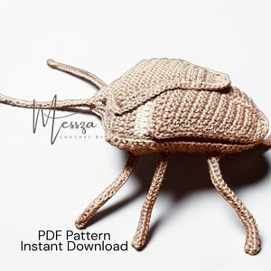 May include: A set of three ceramic nesting bowls in graduating sizes. The bowls are white with a speckled, textured finish. The largest bowl measures approximately 8 inches in diameter.