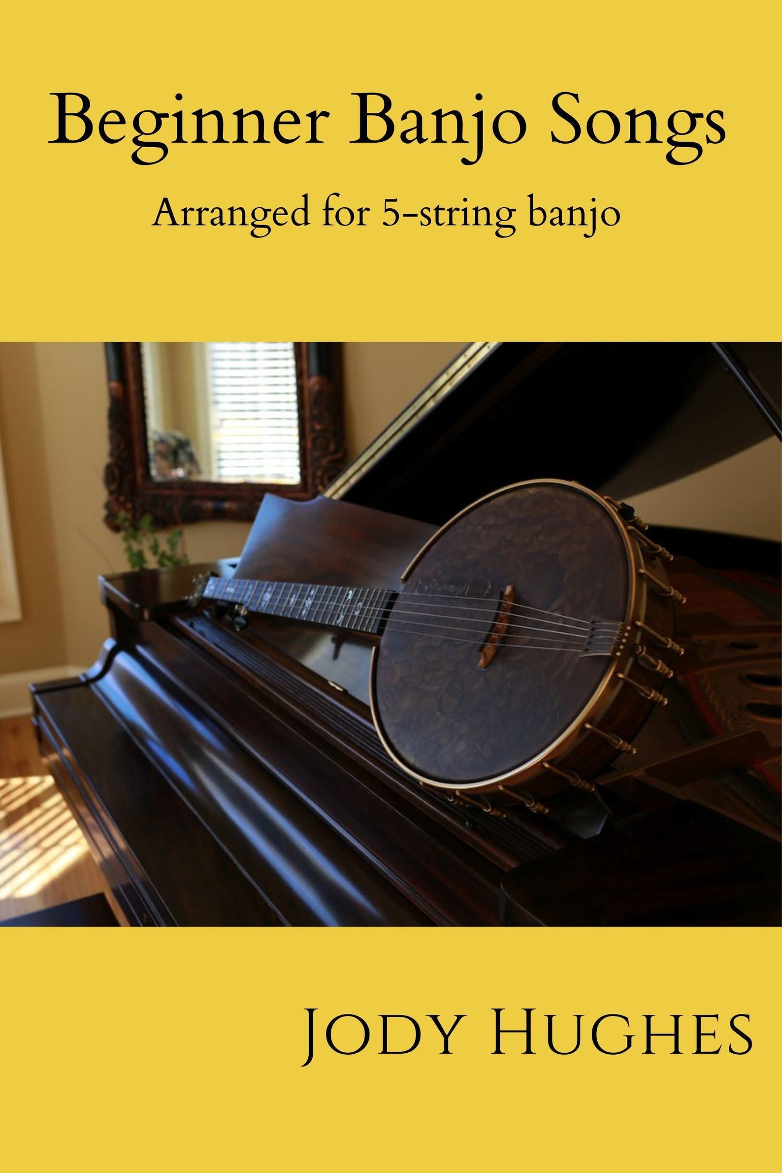 yellow book cover that reads Beginner Banjo Songs