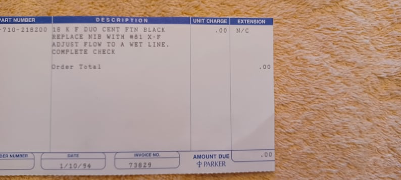 Puede incluir: Un recibo con el texto "PART NUMBER -710-218200 18 KF DUO CENT FIN BLACK REPLACE NIB WITH #81 X-F ADJUST FLOW TO A WET LINE. COMPLETE CHECK Order Total UNIT CHARGE EXTENSION .00 N/C .00 DER NUMBER DATE INVOICE NO 1/10/94 73829 AMOUNT DUE PARKER .00"