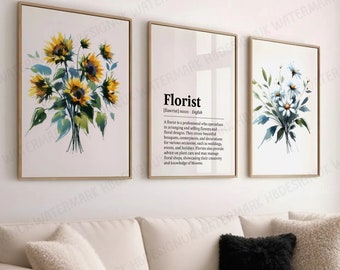 May include: Three framed watercolour paintings with floral designs. The leftmost painting features a bouquet of yellow sunflowers. The middle painting features the word "Florist" with a definition. The rightmost painting features a bouquet of white flowers.