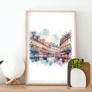 May include: Watercolor painting of a street scene in a European city. The buildings are tall and narrow, with many windows. The street is lined with trees and there are people walking on the sidewalk. The painting is done in a soft, muted palette of blues, greens, and browns.