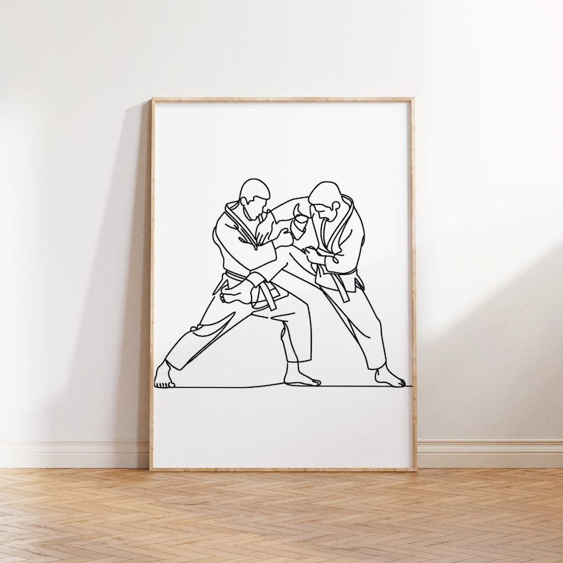 Peut inclure: Dessin au trait de deux personnes en position de combat d'arts martiaux. Les figures sont dessin&eacute;es en un seul trait continu.