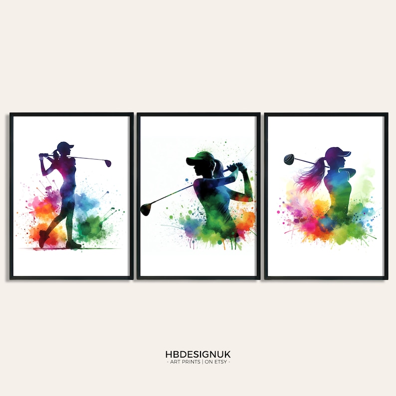 May include: Three framed prints of a golfer in silhouette with colorful watercolor splashes in the background. The golfer is wearing a cap and is swinging a golf club.