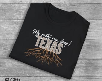 May include: Black t-shirt with a white graphic of a tree with roots and the text "My roots run deep! TEXAS".