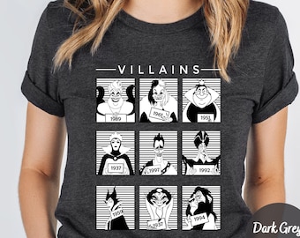 May include: Dark grey heather t-shirt featuring a graphic of cartoon villains in black and white, each in a square with a year. The word "VILLAINS" is printed above the squares.