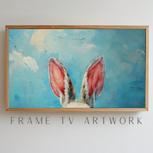 May include: A painting of a rabbit's ears peeking over a blue and white background. The rabbit's ears are pink and white with a soft, fuzzy texture.