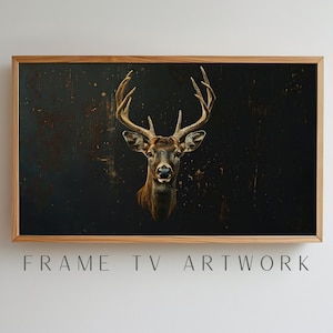May include: Artwork of a deer head with large antlers, set against a dark, textured background. The image is framed in a light-colored wooden frame. Text at the bottom reads "FRAME TV ARTWORK".