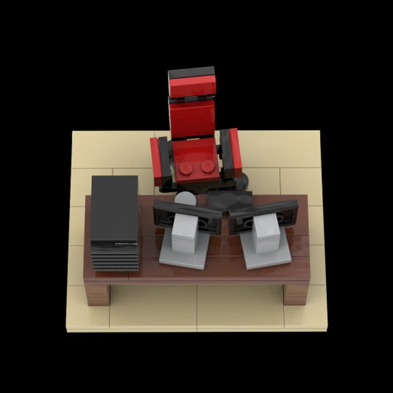 May include: A red gaming chair with black accents sits in front of a desk with two black computer monitors and a black tower. The desk is made of wood and has a light brown finish. The chair has a black base with wheels.