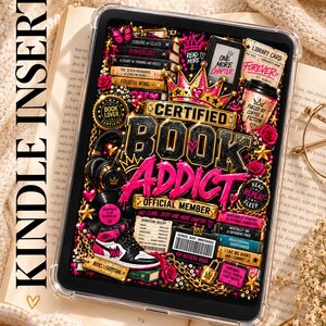 May include: A digital download Kindle insert featuring a vibrant graphic with the text Certified Book Addict, Official Member, and various book-themed illustrations including stacks of books, a crown, a coffee cup, and trainers in pink, gold, and black.