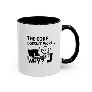 May include: White ceramic mug with a black interior and handle. The mug features the text "THE CODE DOESN'T WORK... WHY?" and a stick figure at a computer, expressing frustration. A humorous gift for programmers.