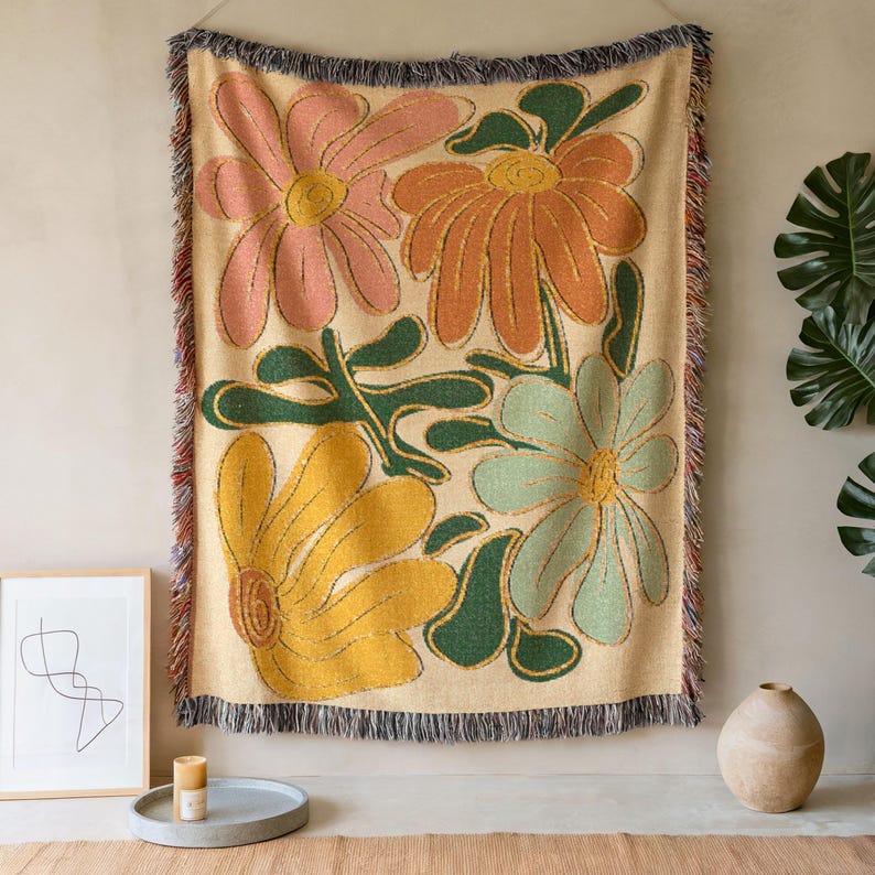 Boho flower woven blanket with vintage large floral design in earthy tones.  Showns 4 large flowers in retro style design in earth tone colors.  Perfect as  tapestry, throw for sofa, bed, or wall hanging,  Beige color shown here as a wall tapestry.