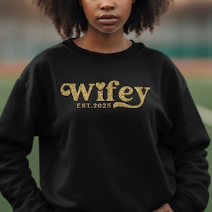 グリッターワイフ2025シャツ、花嫁、婚約シャツ、ハネムーンシャツ、ブライダルギフト、ウェディングTシャツ、ブライダルシャワーギフト、花嫁、未来の奥様
