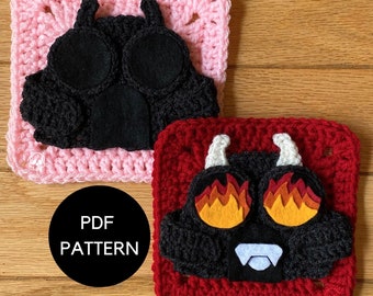 May include: Two crocheted squares with black felt appliques. The square on the left is pink and the square on the right is red. Both squares feature a black felt applique of a cartoon character with eyes and a mouth. The square on the right has orange felt flames above the character's eyes. The text "PDF PATTERN" is visible in a black circle below the squares.