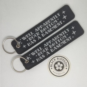 Well Apparently Rock Bottom Has A Basement Jet Tag | JDM Keyring | Key Chain | Humour Gift | Funny Keyring