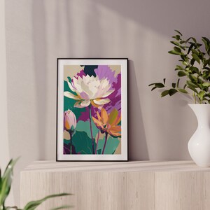 May include: A framed print of a colorful floral illustration featuring white, pink, orange, and green flowers. The print is in a black frame and is hanging on a light wood shelf.