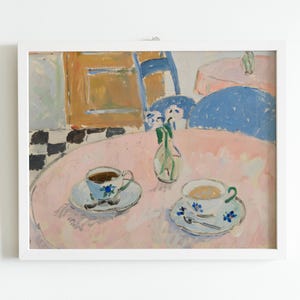 May include: A framed painting depicting a pink table with two teacups on saucers, a small glass vase with flowers, and a blue chair. The background shows a checkered floor and a wooden cabinet, rendered in a painterly style with visible brushstrokes.