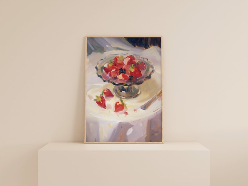 May include: A painting of a glass bowl filled with red strawberries and blackberries, sitting on a white tablecloth. There are a few strawberries on the table next to the bowl.