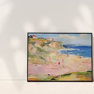 Puede incluir: Una pintura que representa una escena de playa con un acantilado en el fondo. El cielo es azul con nubes blancas. El agua es azul y hay gente en la playa. La pintura est&aacute; enmarcada en negro.