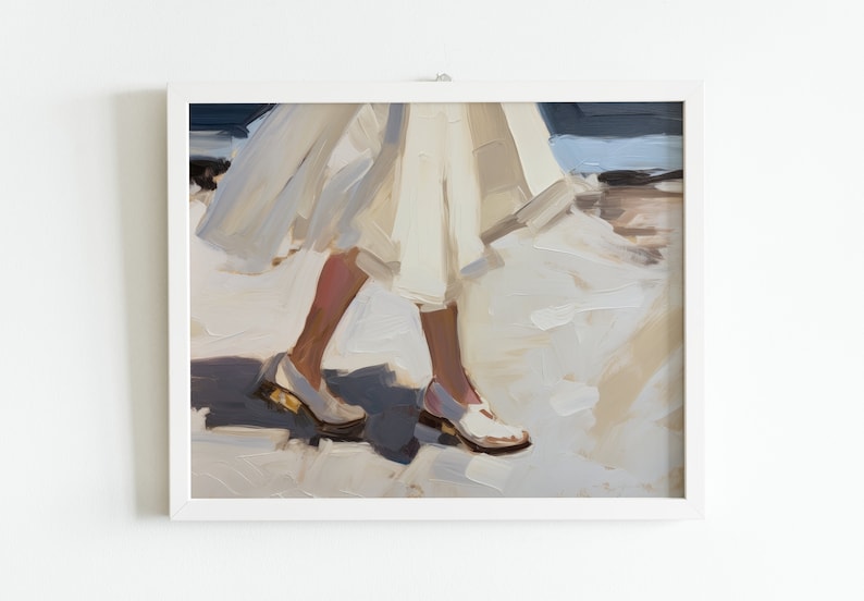 May include: An oil painting framed in white depicts a person walking, with focus on the legs and feet. The person wears a white dress and white shoes with gold accents. The artwork uses a palette of whites, creams, and blues.