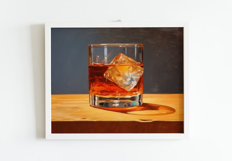 May include: A glass of amber-colored liquid with a large ice cube, sitting on a wooden surface. The glass is clear and has a rounded bottom.