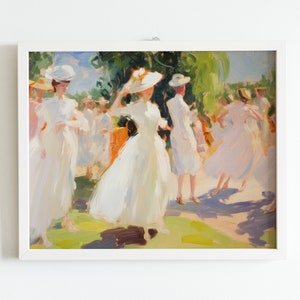 May include: An impressionistic painting in a white frame depicts a group of people in white dresses and hats outdoors. The artwork uses soft brushstrokes and a pastel color palette, with green foliage and blue sky visible.