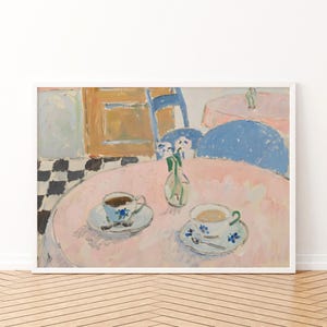 May include: A framed art print depicting an interior scene with a pink round table, two teacups on saucers, a small vase with flowers, a blue chair, and a black and white checkered floor, rendered in a painterly style with visible brushstrokes.