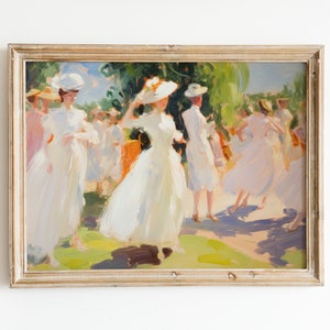 May include: Oil painting in a distressed gold frame depicts a group of people in white dresses and hats in a sunny outdoor setting. The artwork has a soft, impressionistic style with visible brushstrokes and a focus on light and shadow.