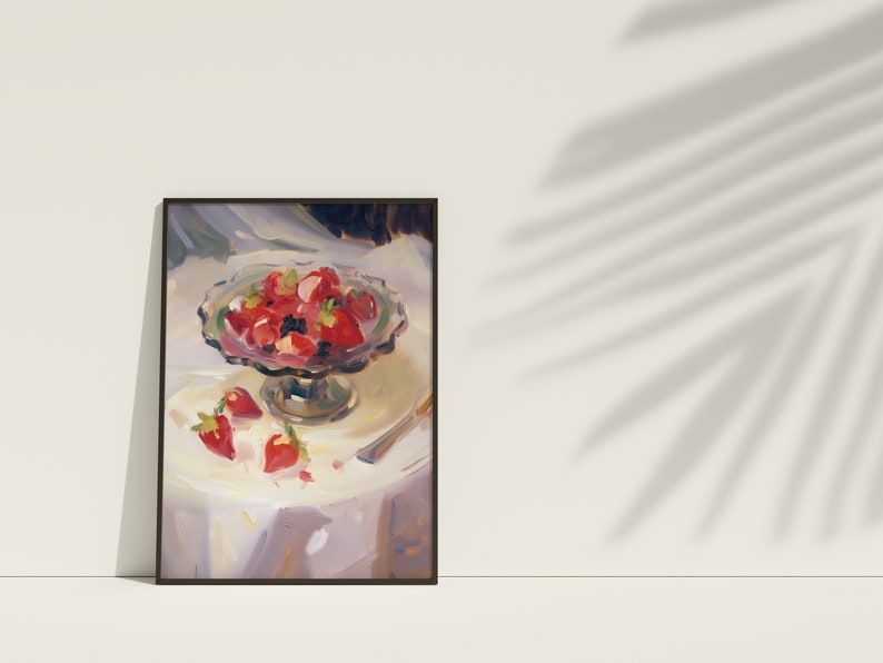 May include: A painting of a bowl of red strawberries on a white tablecloth. The bowl is on a pedestal and there are a few strawberries scattered around the bowl.