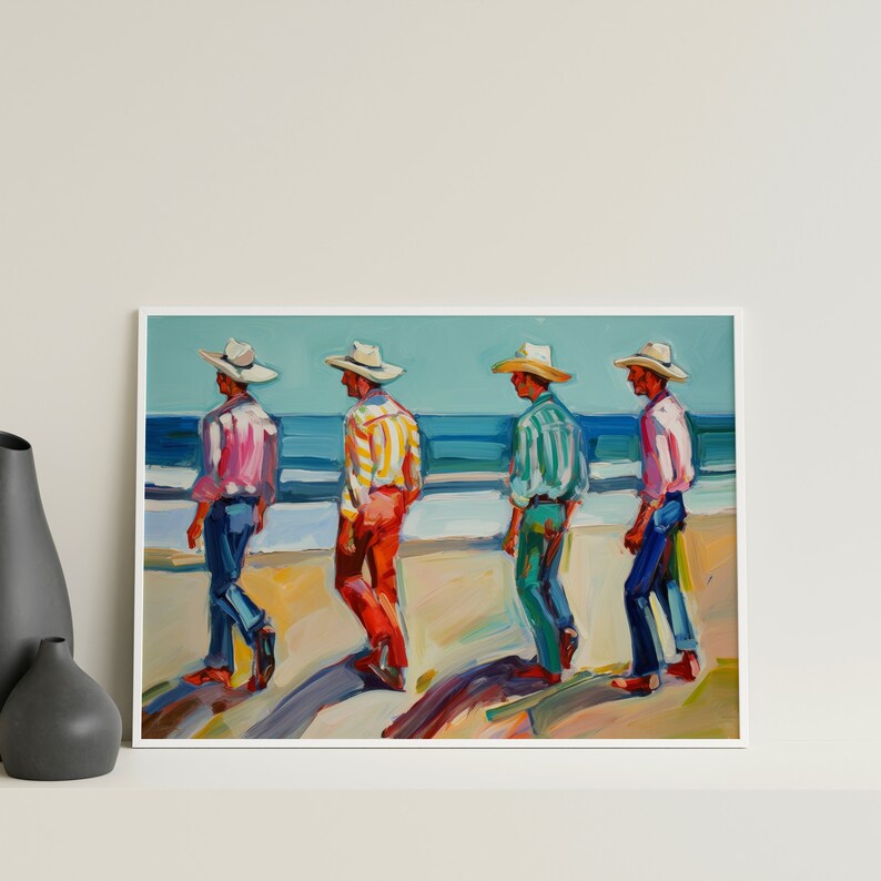 May include: An oil painting depicts four figures in cowboy hats walking on a beach. Each figure wears a different colored shirt: pink, yellow striped, green striped, and pink. The ocean and sky are blue. The artwork is framed in white.