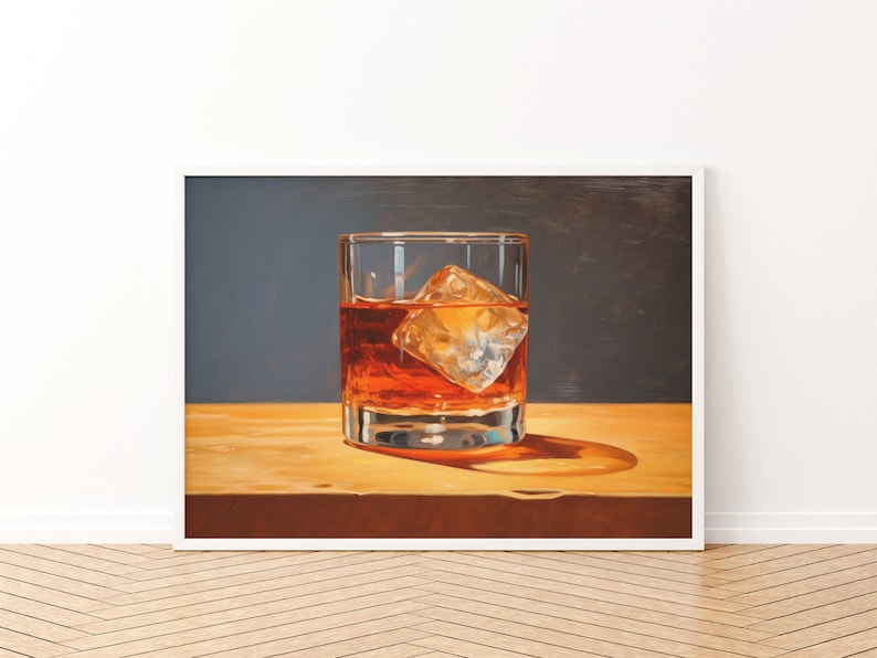 May include: A glass of amber-colored liquid with a large ice cube in it, sitting on a wooden surface. The glass is clear and has a rounded bottom.