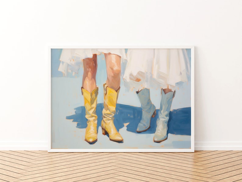 May include: A painting of two pairs of legs wearing boots. One pair is wearing yellow cowboy boots and the other pair is wearing light blue cowboy boots. The legs are wearing white dresses.