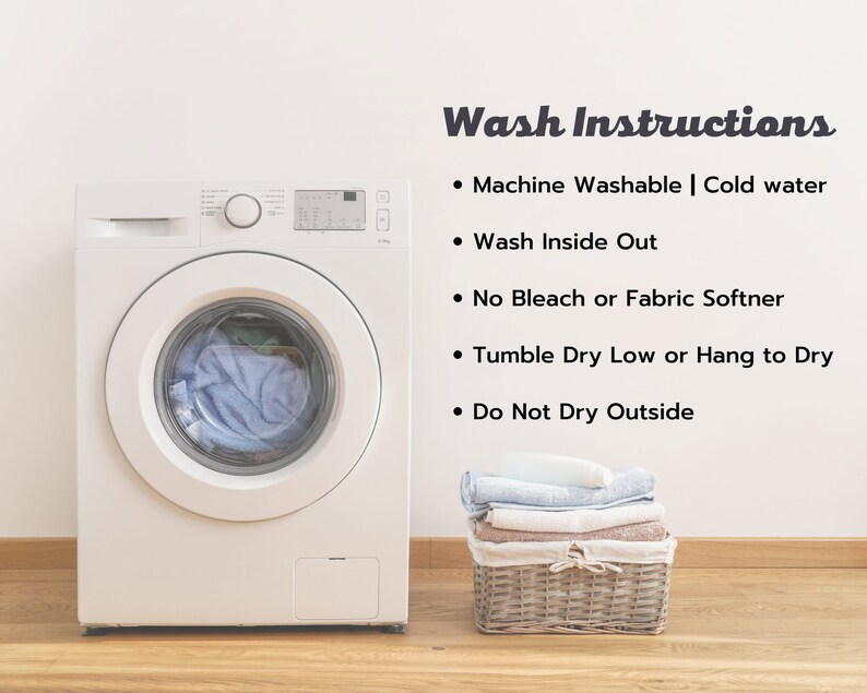 May include: White washing machine with a blue towel inside the drum.  Wash instructions are listed on a white wall: Machine Washable | Cold water, Wash Inside Out, No Bleach or Fabric Softner, Tumble Dry Low or Hang to Dry, Do Not Dry Outside.