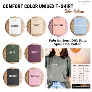 May include: A selection of Comfort Color unisex t-shirts in colours such as white, ivory, peachy, and chambray. Other colours include moss, berry, pepper, and blossom. The shirts are made from 100% ring-spun USA cotton. Measurements are in inches.