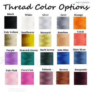 May include: Image showing thread colour options with the text "Thread Color Options" at the top. The image displays a grid of thread samples in various colours, including black, white, silver, grey, orange, pale yellow, sunflower, mustard, bamboo, coral, purple, peacock green, dark green, sala blue, slate blue, pale pink, floral pink, salmon, brown, and burgundy.