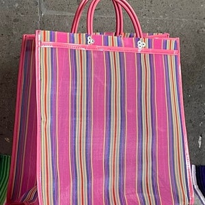 Kleurrijke nylon herbruikbare tassen en manden Roze