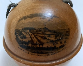 Mauchline ware vintage treen string box. Wood souvenir from an English seaside town. Picture is titled: Sea Mills and Pavilions, Mablethorpe