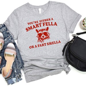 You&#39;re either a smart smella or a fart smella Unisex Jersey Short Sleeve Tee