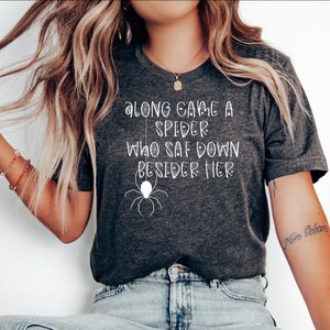 Along Came a Spider and Sat Down Beside Her Unisex Tee - Spooky Halloween Lettering Graphic Shirt - Eerie  Jersey Short Sleeve T-Shirt