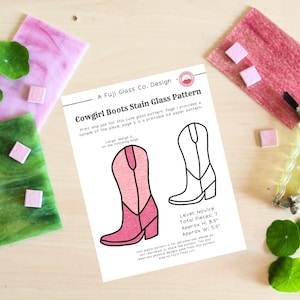May include: A printable pattern for a stained glass cowgirl boot craft project. The pattern is pink and white and includes instructions for a novice crafter. The boot is approximately 8.5 inches tall and 5.5 inches wide.