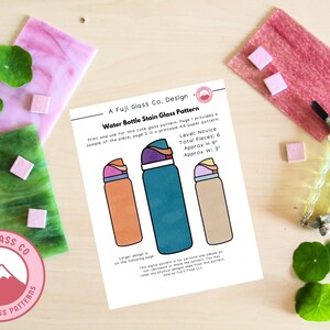 May include: A printable stained glass pattern for a water bottle. The pattern is for a novice crafter and includes 6 pieces, measuring approximately 9 inches tall and 3 inches wide. The pattern is printed on white paper with a black outline.