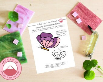 May include: A printable stained glass pattern for a butterfly with purple, pink, and gold accents. The pattern is labeled "Butterfly Stain Glass Pattern" and includes the text "Level: Novice, Total Pieces: 10, Approx H: 5", and "Approx W: 6".
