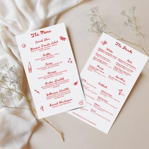 May include: Two white menu cards with red text and illustrations. The left card reads "The Menu" and lists dishes like Carrot Slaw and Chicken Shashlik. The right card says "The Drinks" and lists wines and cocktails.
