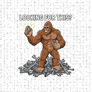 May include: A cartoon illustration of a brown Bigfoot-like creature holding a socket wrench and a socket. The text "LOOKING FOR THIS?" is above the creature. The creature is standing on a pile of wrenches.